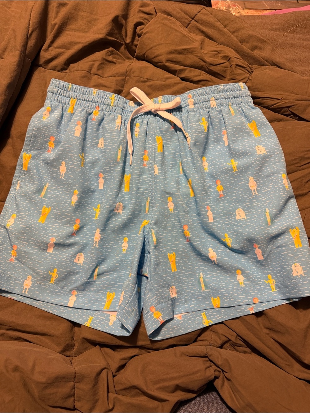 chubbies Light Blue Swim Trunks with Yellow & Pink Surfers